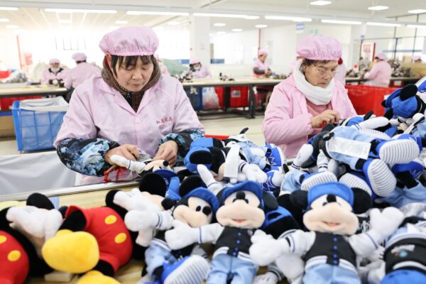 China’s factory activity returns to growth, expanding at its sharpest pace in a year