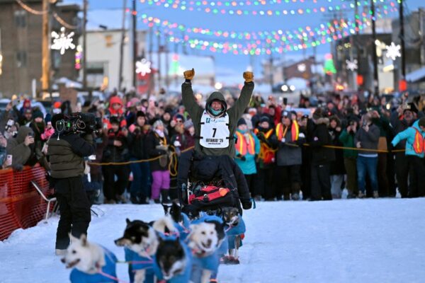 Former reality TV star Jessie Holmes repeats as champion of the grueling Iditarod sled dog race