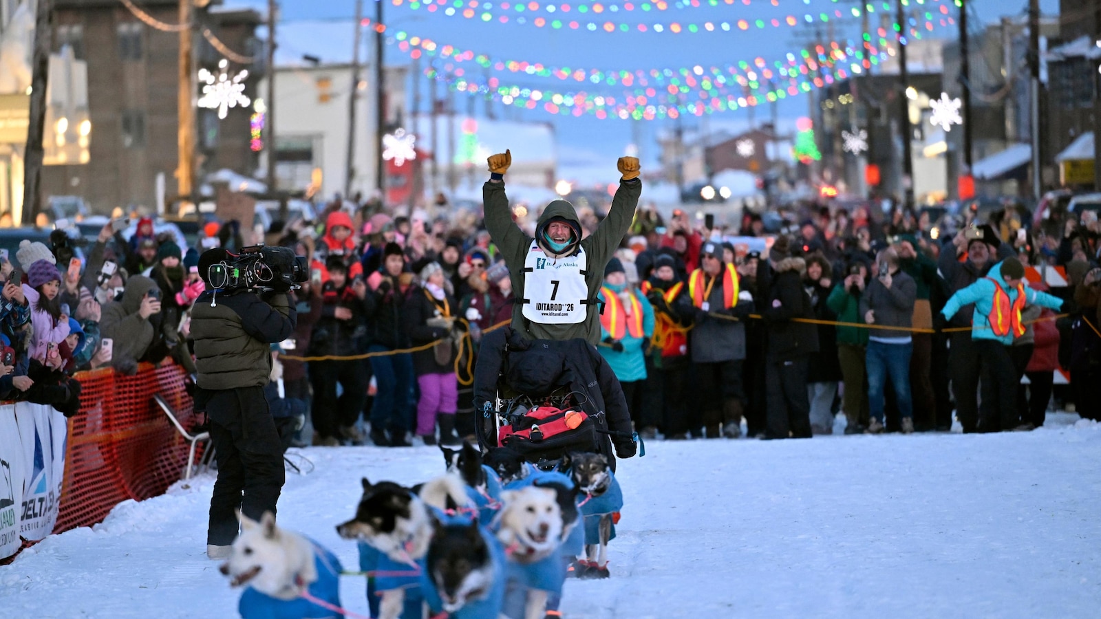 Former reality TV star Jessie Holmes repeats as champion of the grueling Iditarod sled dog race