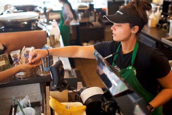 Starbucks to award bonuses to baristas, expand tipping
