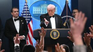 Trump Truth Social post threatens Iran with AI picture of himself with gun