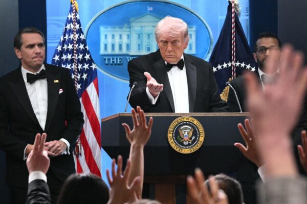 Trump Truth Social post threatens Iran with AI picture of himself with gun