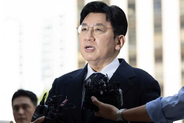 South Korean police seek to arrest K-pop mogul behind BTS