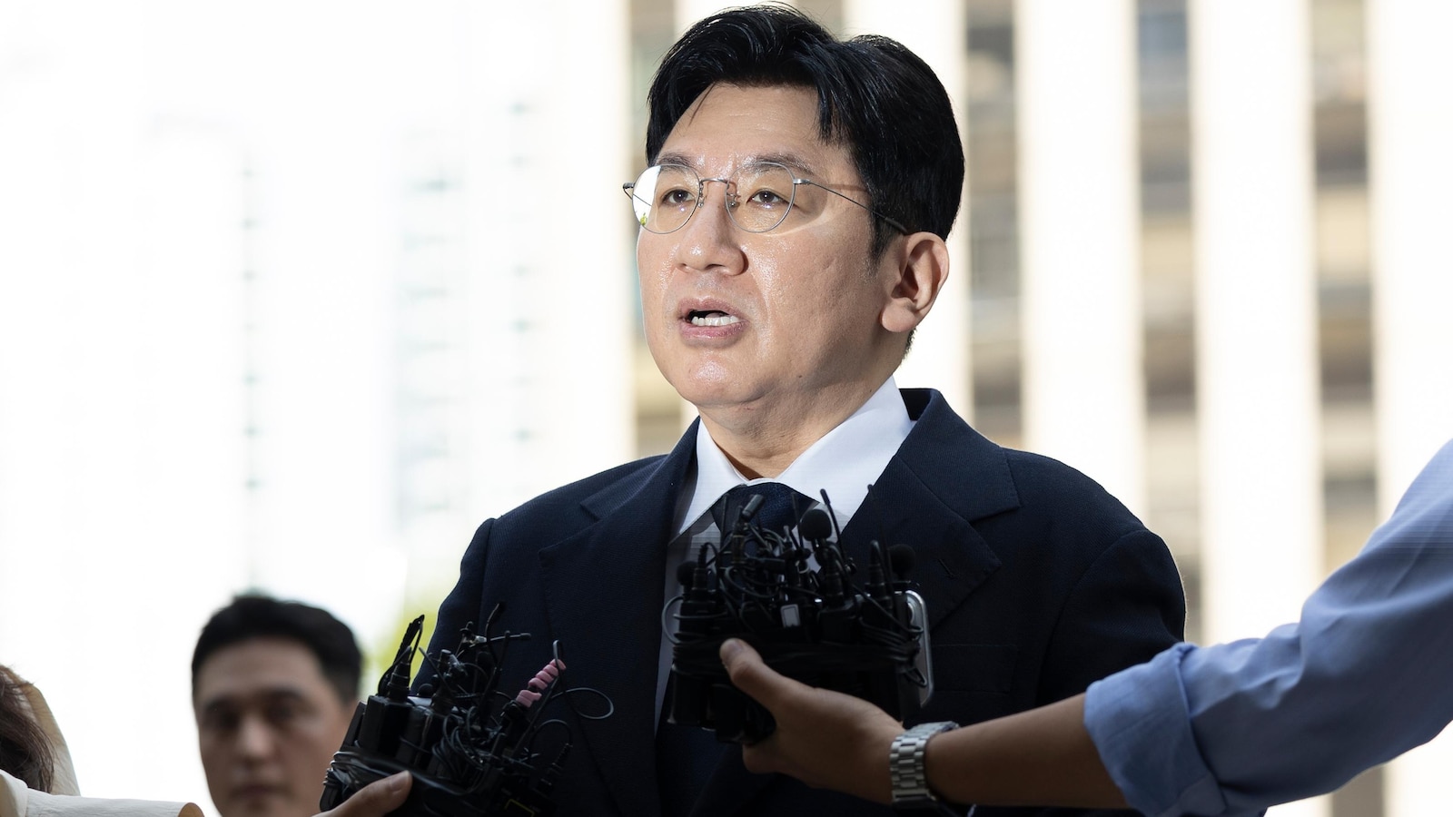 South Korean police seek to arrest K-pop mogul behind BTS