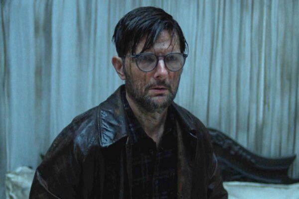 Movie Review: Adam Scott gets spooked in a haunted hotel in ‘Hokum’