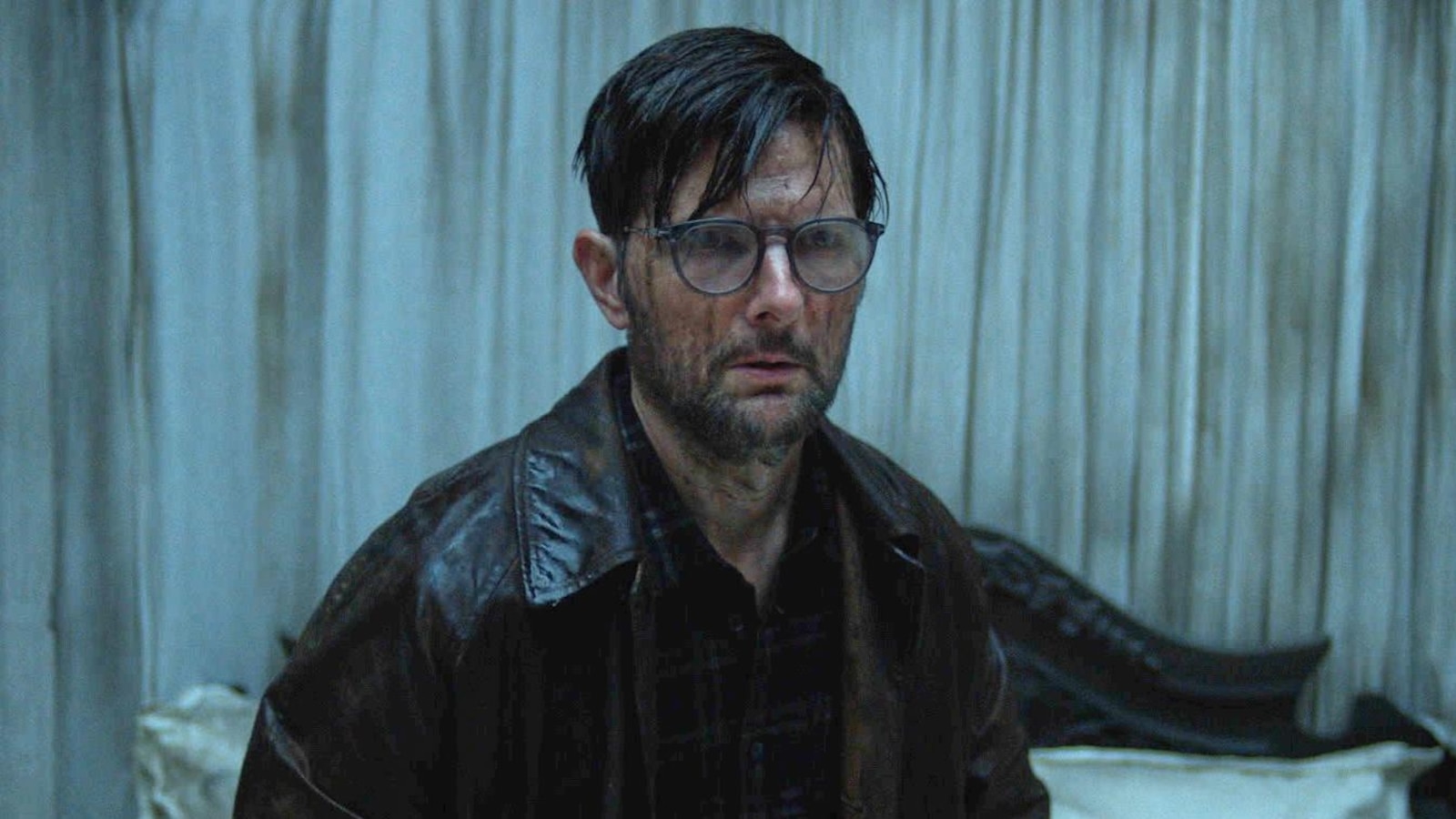 Movie Review: Adam Scott gets spooked in a haunted hotel in ‘Hokum’