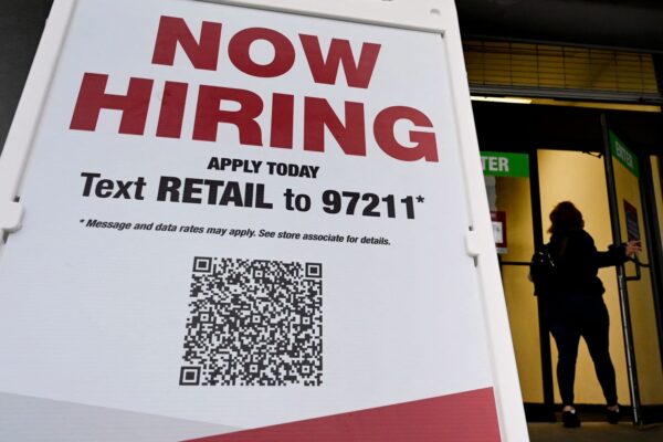 Retailers hire big, defying consumer warning signs