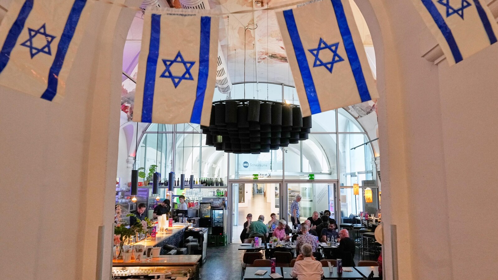 A Vienna cafe offers a welcome for Israel supporters as tensions brew at the Eurovision Song Contest