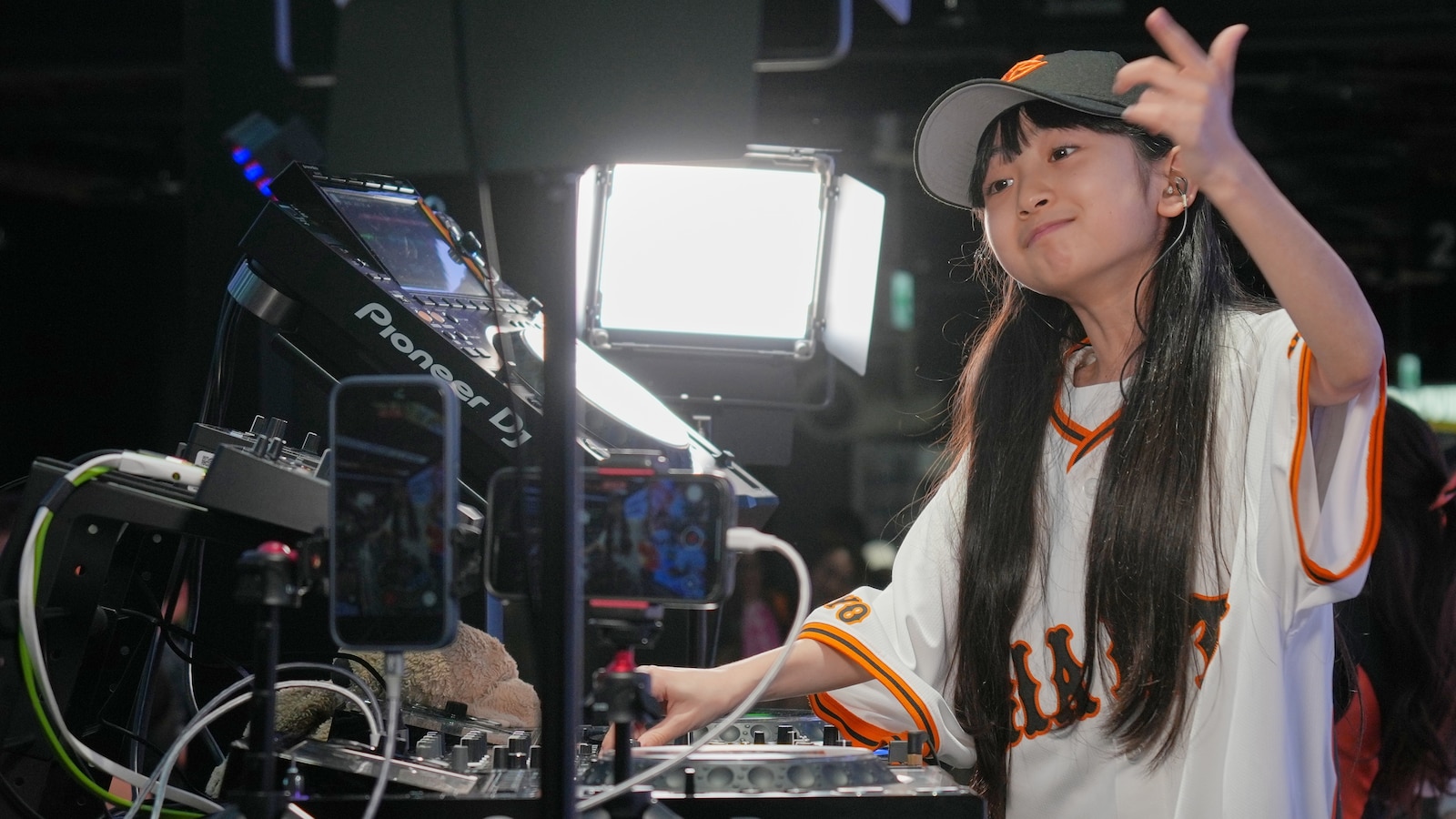 Japan’s DJ Rinoka bobs to the beat as a child prodigy techno artist
