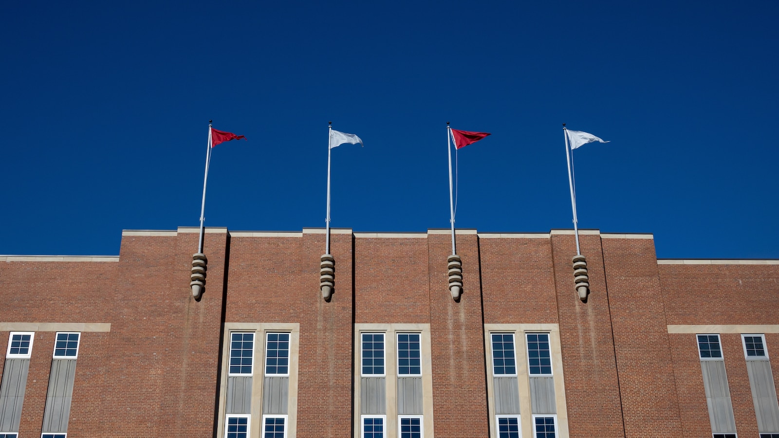 Lawsuit by 31 ex-athletes alleging abuse, misconduct by ex-head trainer dismissed